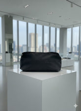 ESSENTIALS EMBOSSED BELT BAG